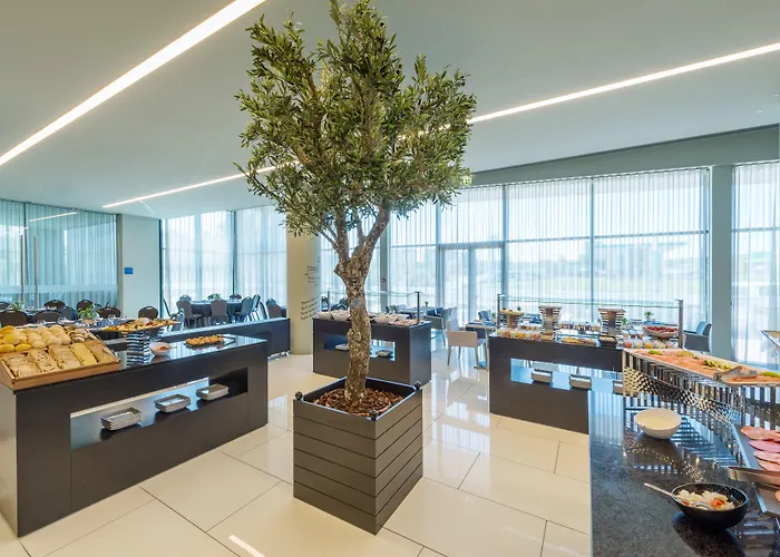 Отель Melia Aeroporto Лиссабон