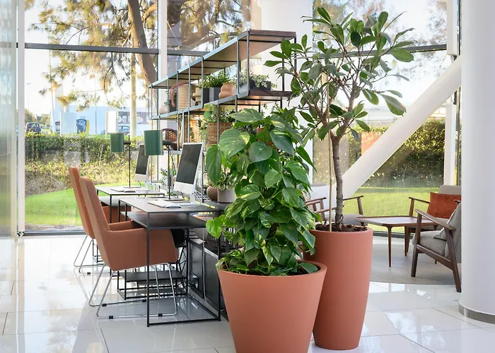 Melia Aeroporto Отель